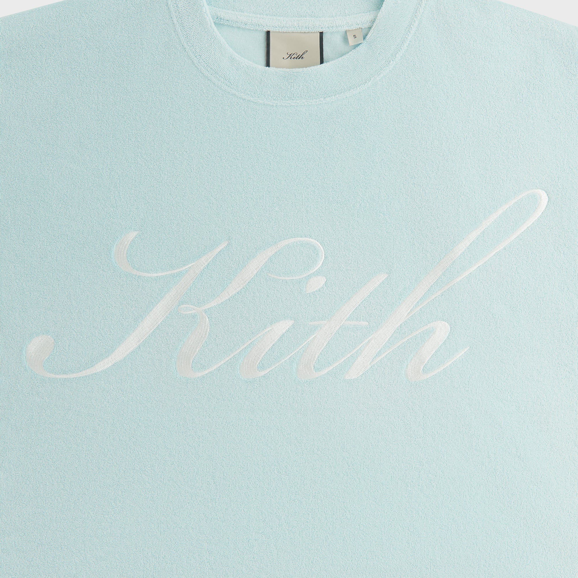 10005-kith-women-min-towel-terry-cropped-tee-1.webp