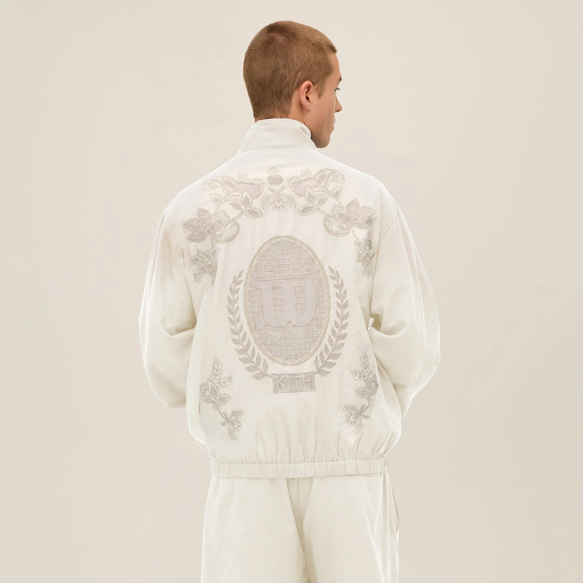 12165-kith-for-wilson-embroidered-mesh-track-jacket-1.webp