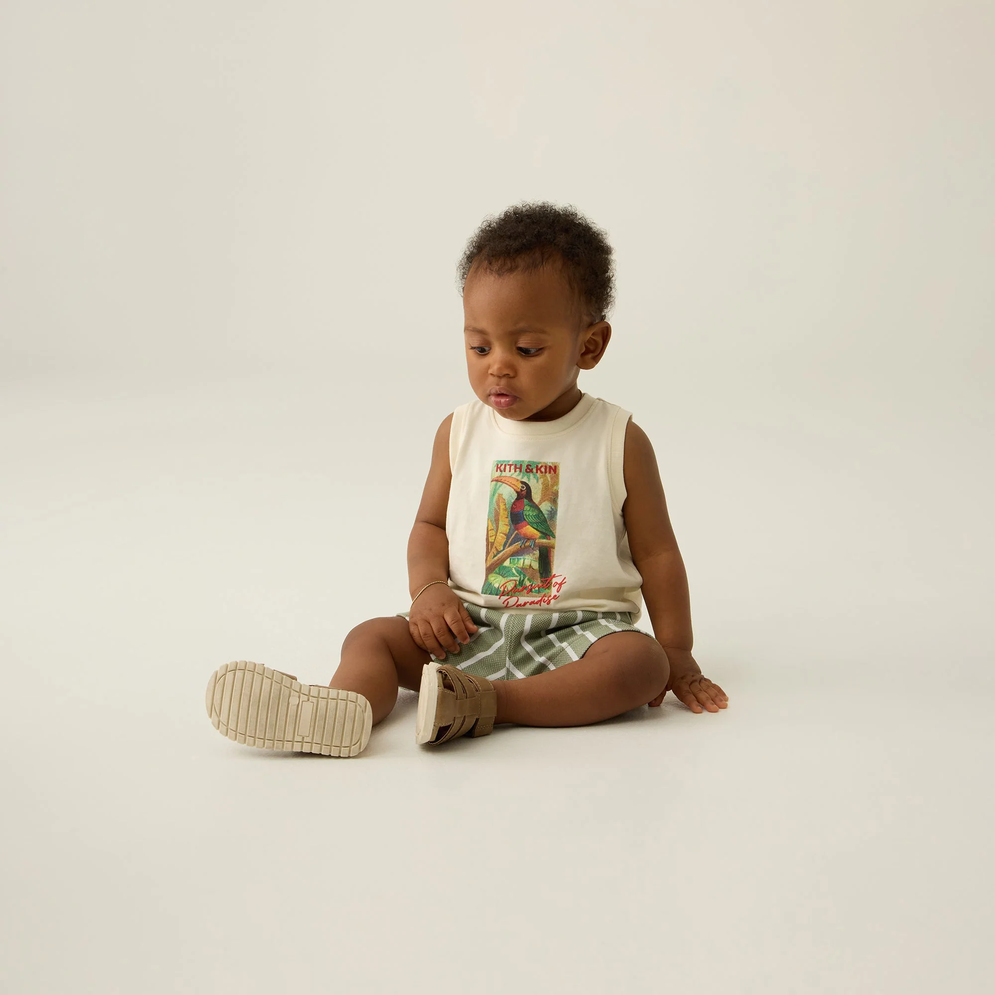 12545-kith-baby-pursuit-of-paradise-muscle-tank-1.webp