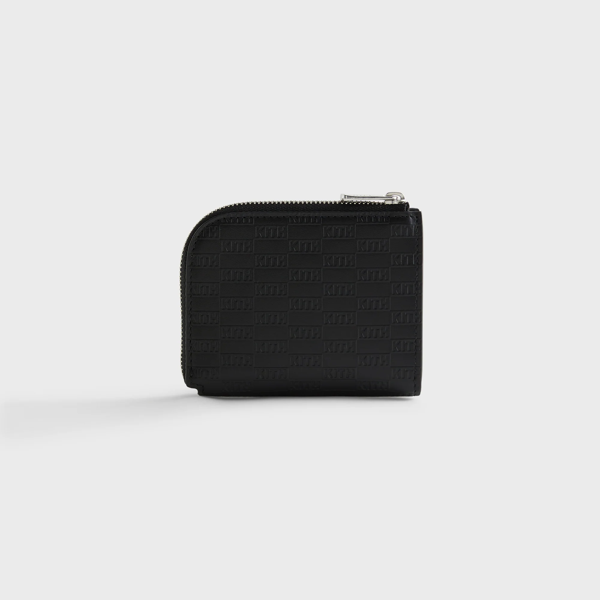 6067-kith-monogram-half-zip-wallet-1.webp