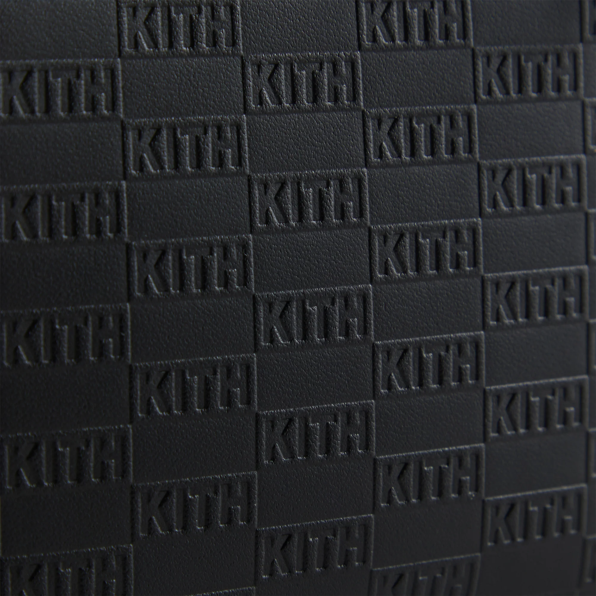 6067-kith-monogram-half-zip-wallet-1.webp