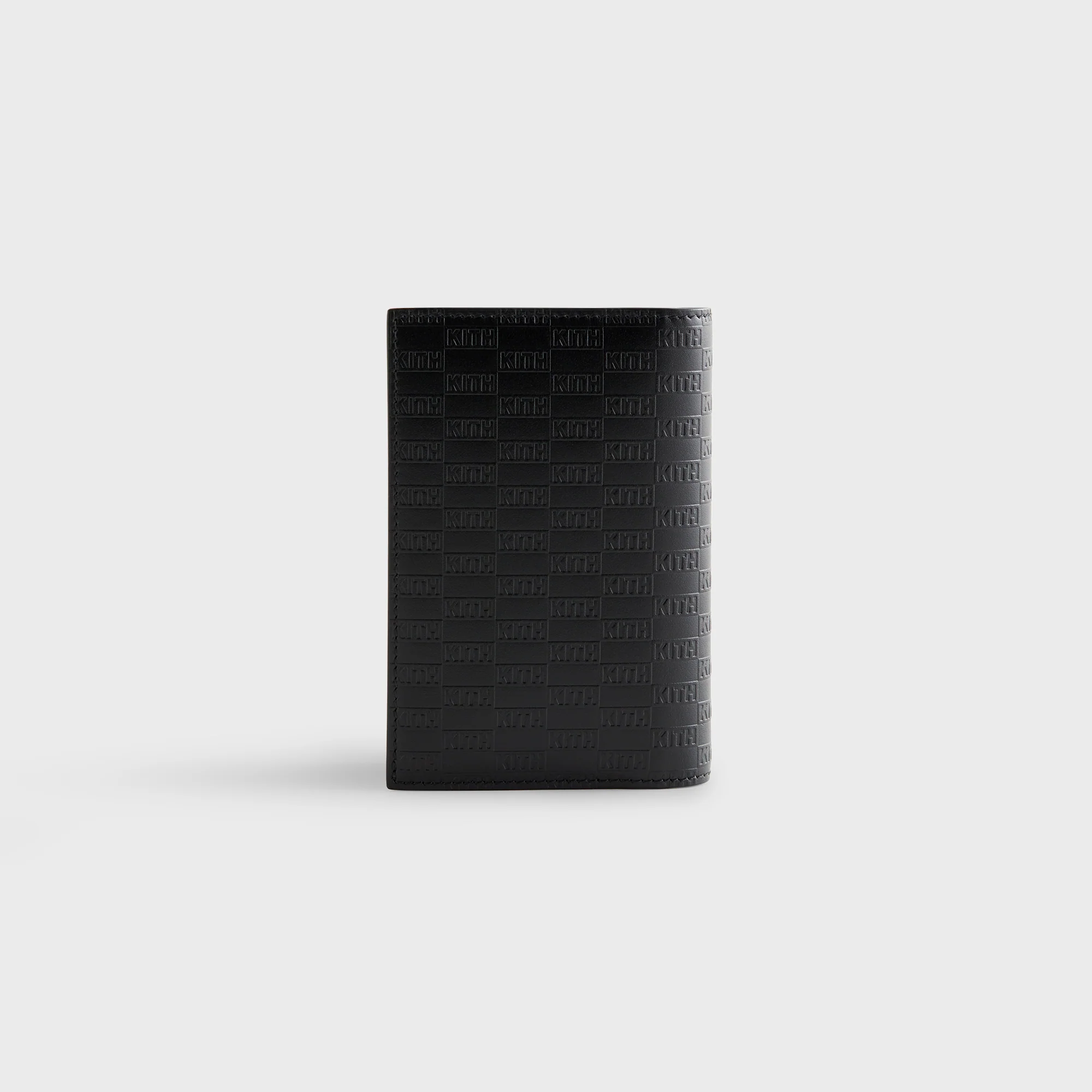 6075-kith-monogram-passport-holder-1.webp