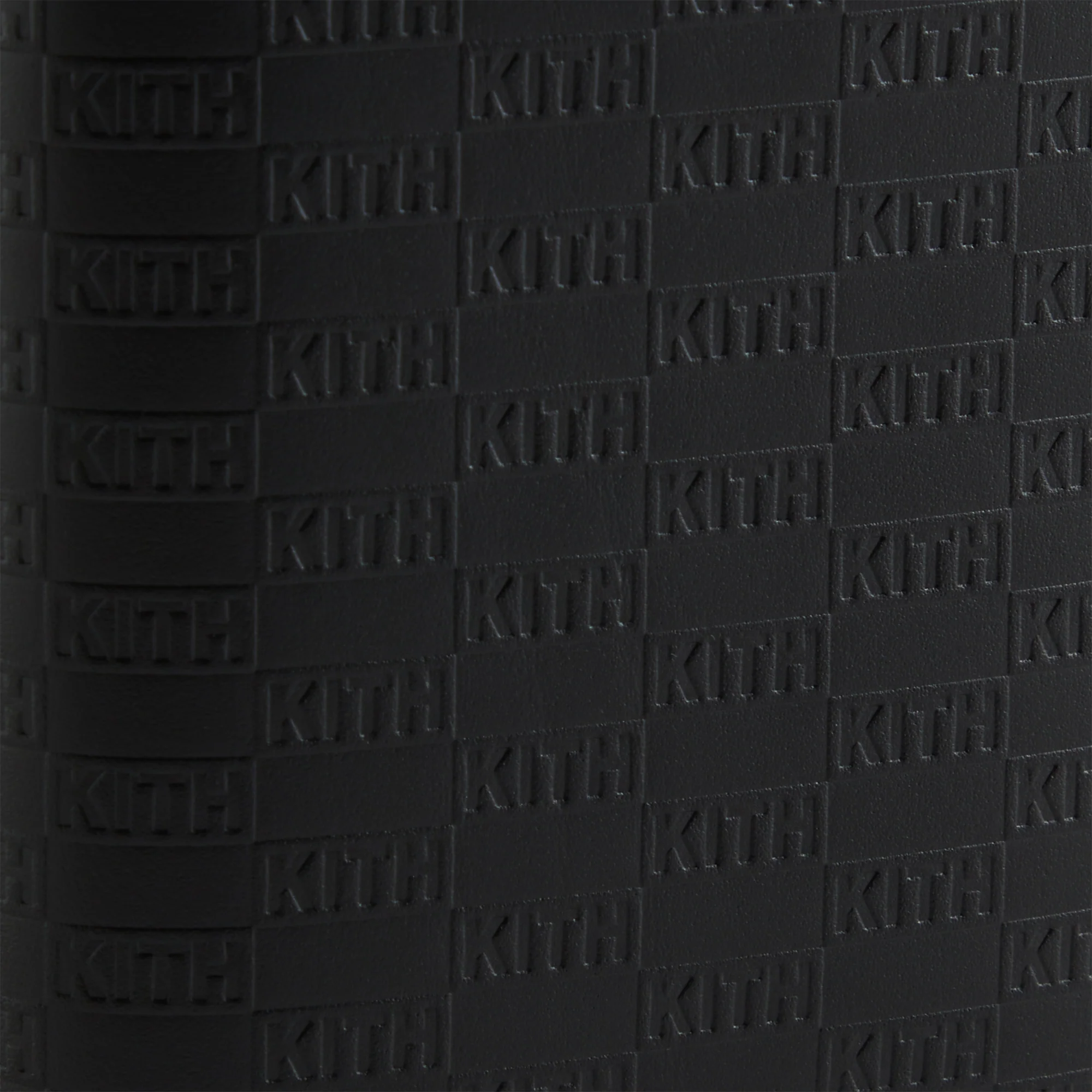 6075-kith-monogram-passport-holder-1.webp