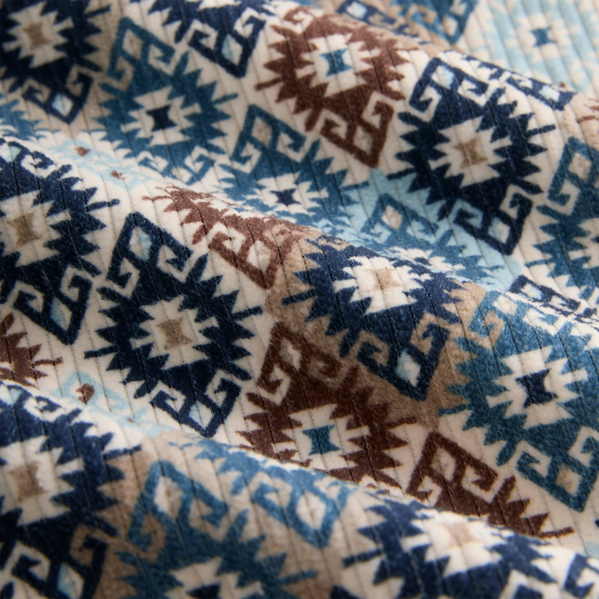7495-kith-kilim-mosaic-brixton-puffed-shirt-jacket-1.webp