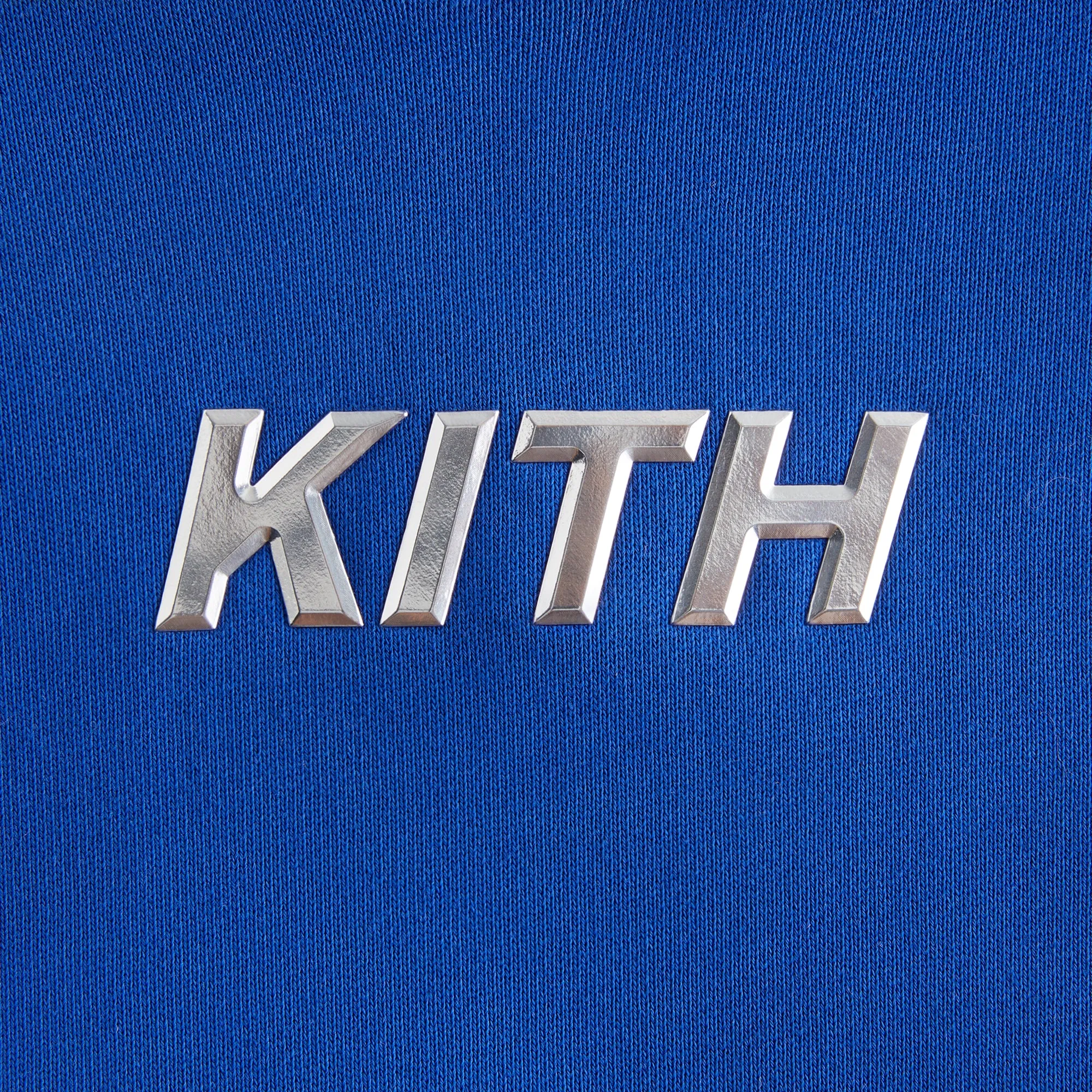 7845-kith-kids-novelty-logo-raglan-nelson-hoodie-1.webp