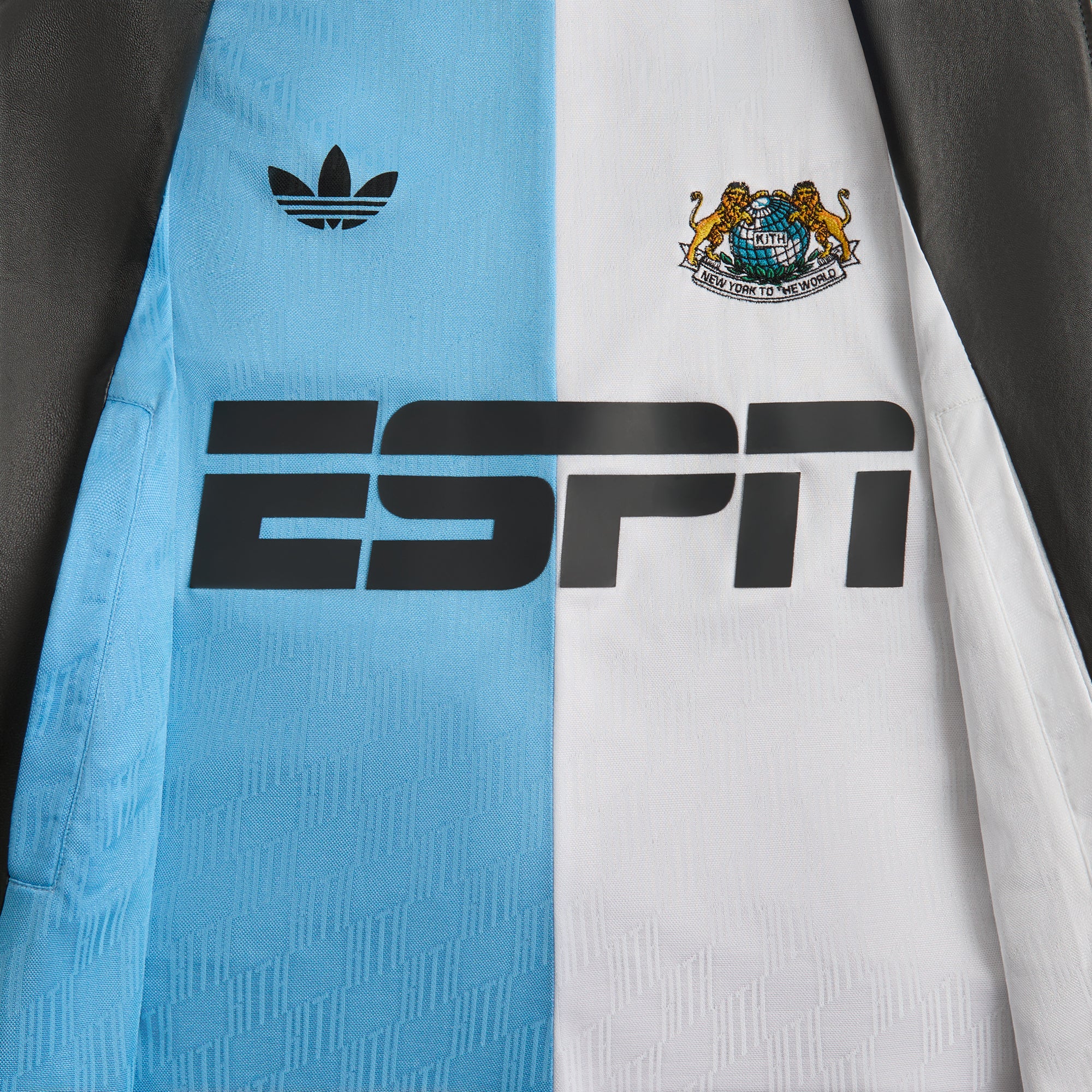 9195-kith-for-adidas-football-stadium-coat-1.webp