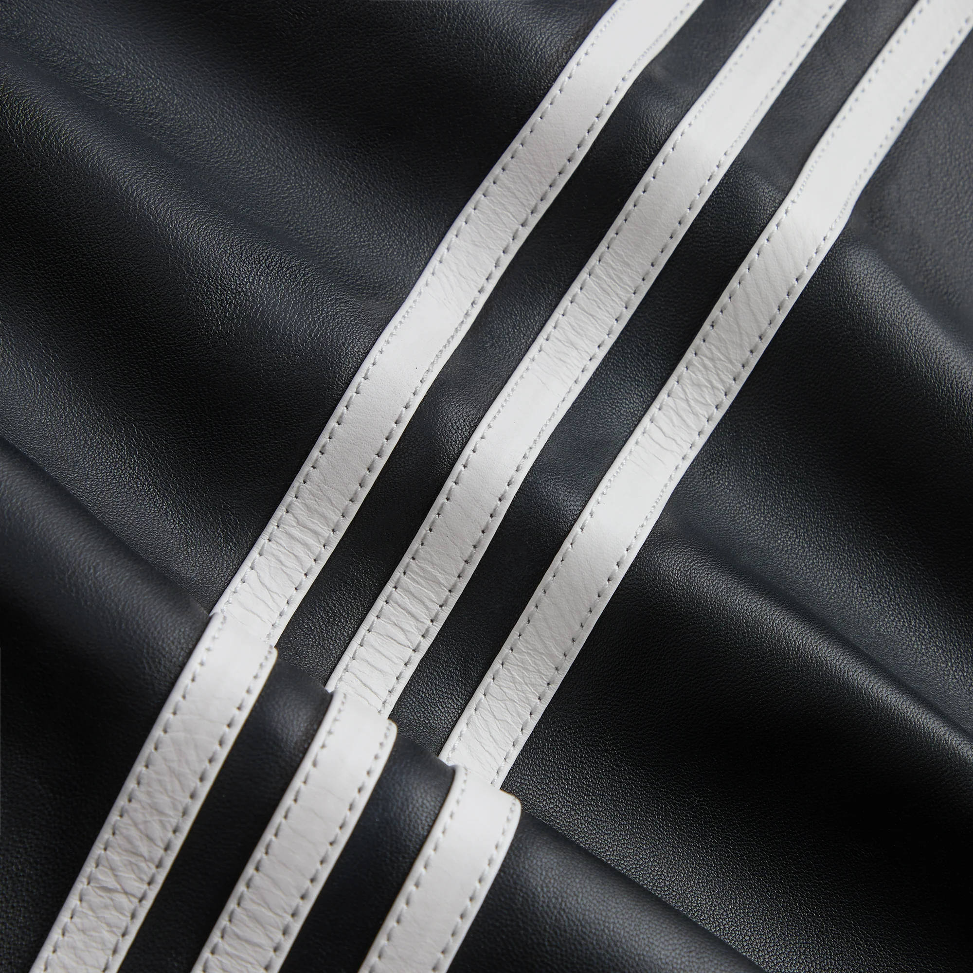 9195-kith-for-adidas-football-stadium-coat-1.webp